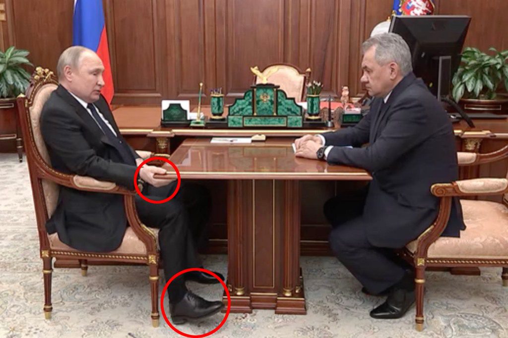 Putin greift während eines Meetings auf mysteriöse Weise nach dem Schreibtisch. 